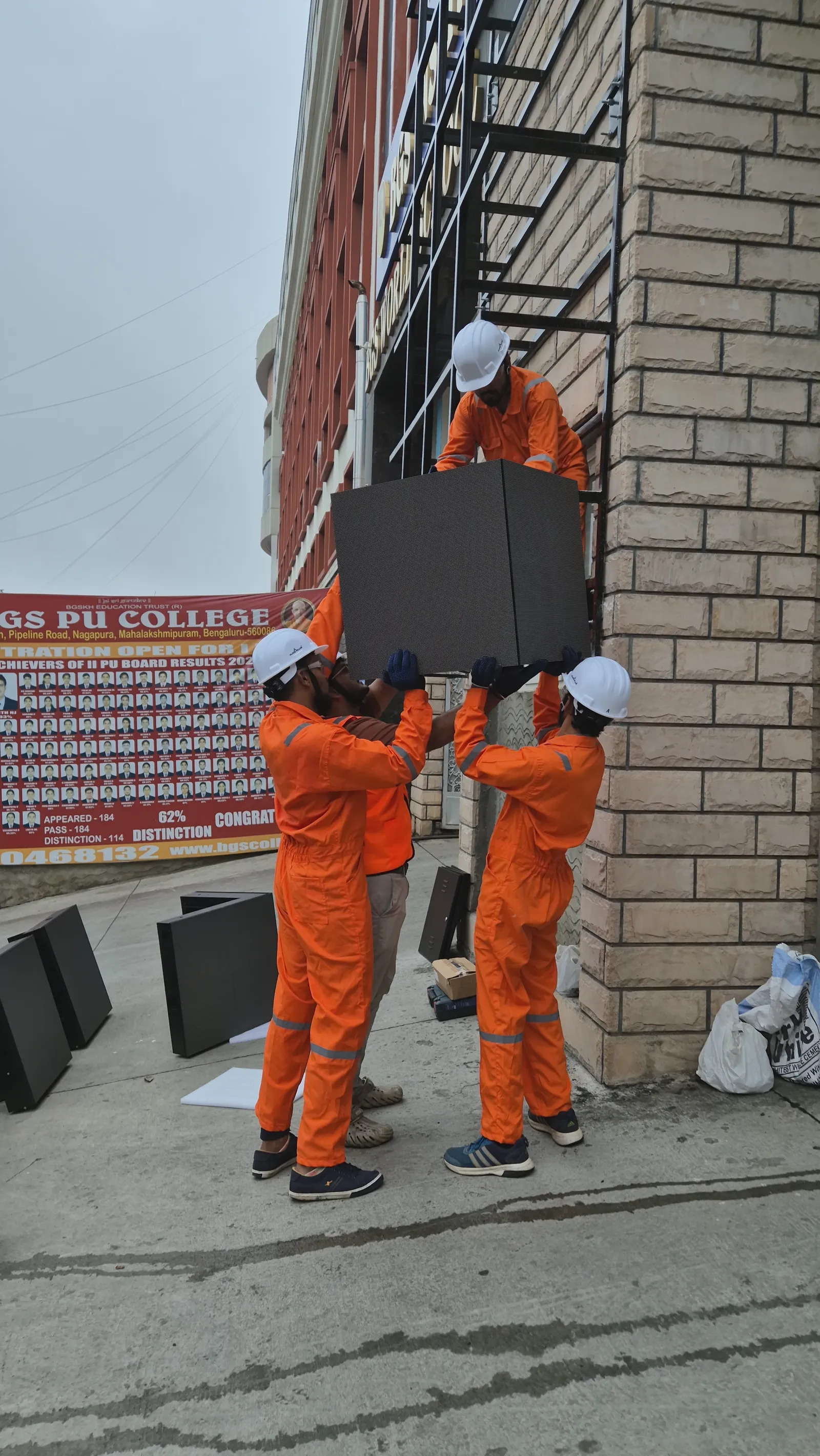 Chesney installation team fitting an LED display