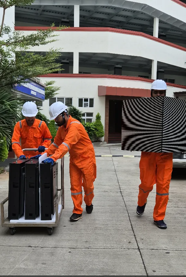 Chesney team transporting LED cabinets on site